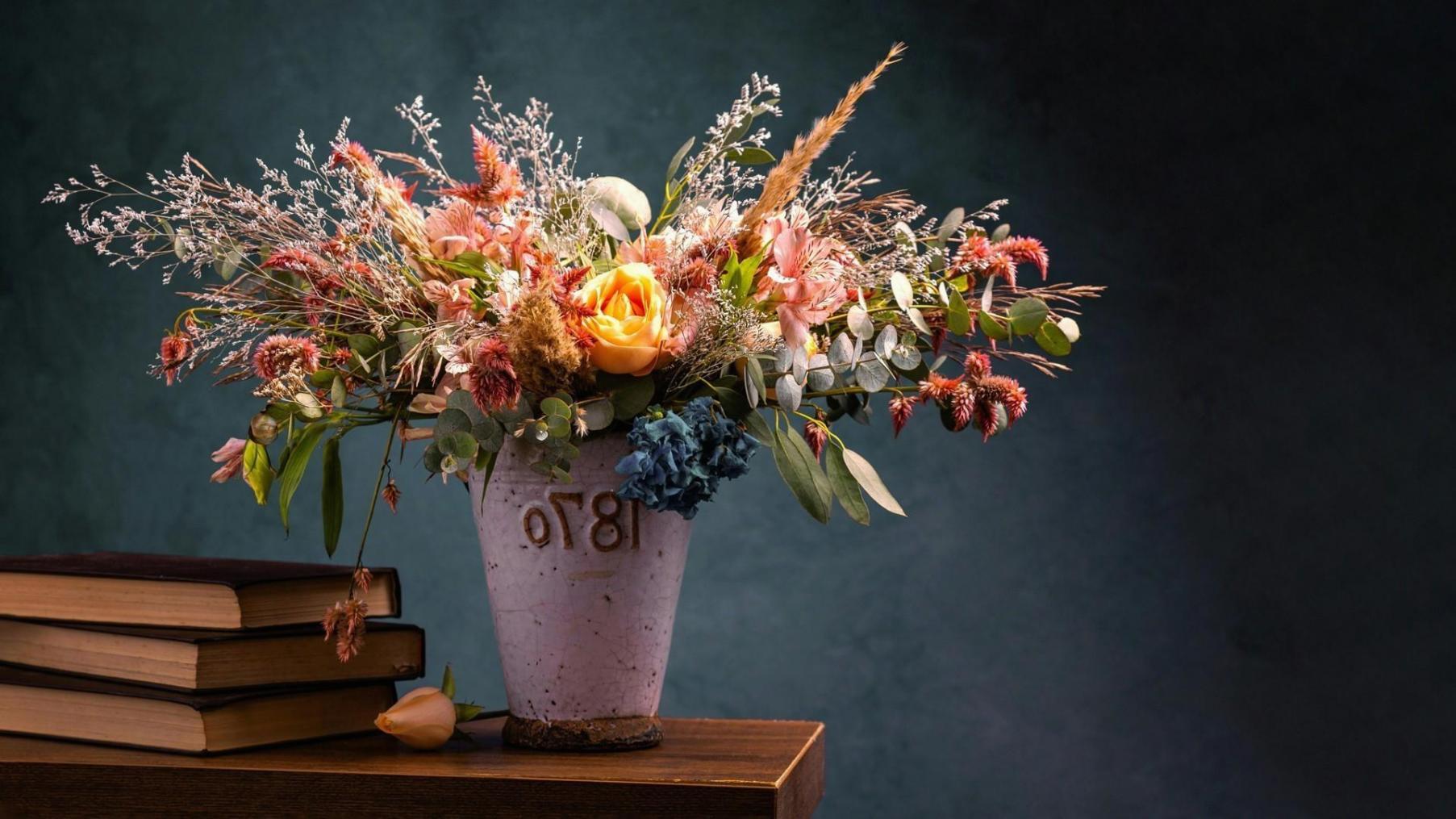 Professional corporate flower arrangement in elegant office setting